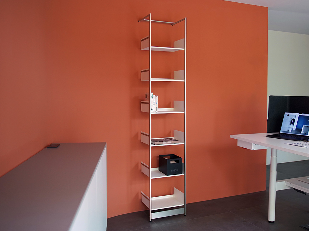 Lean-on metal bookshelf with brush chrome finish